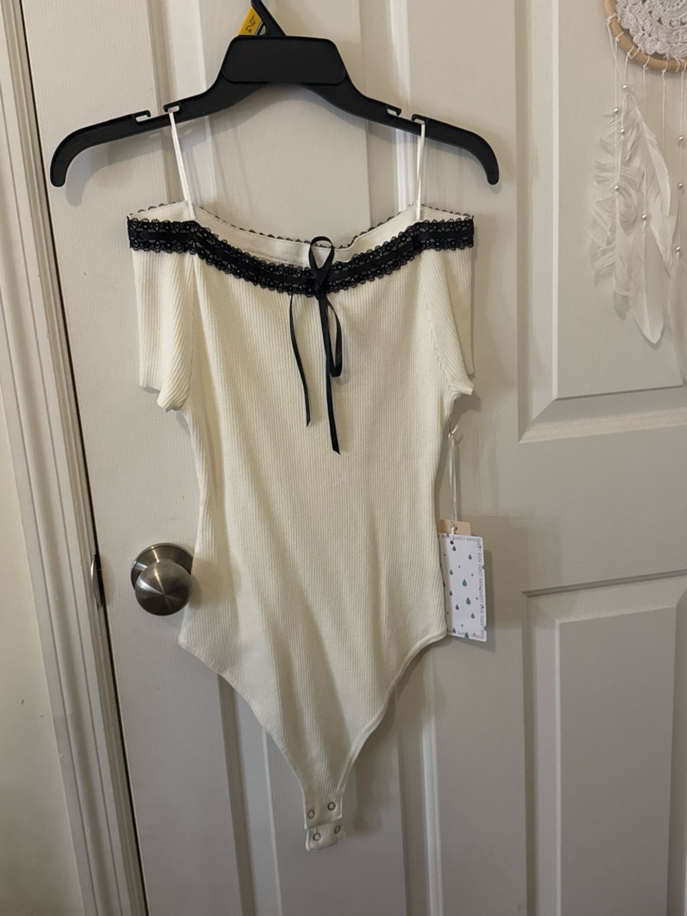Sweet Rain Ivory Ribbed Top with Black Trim and Bow